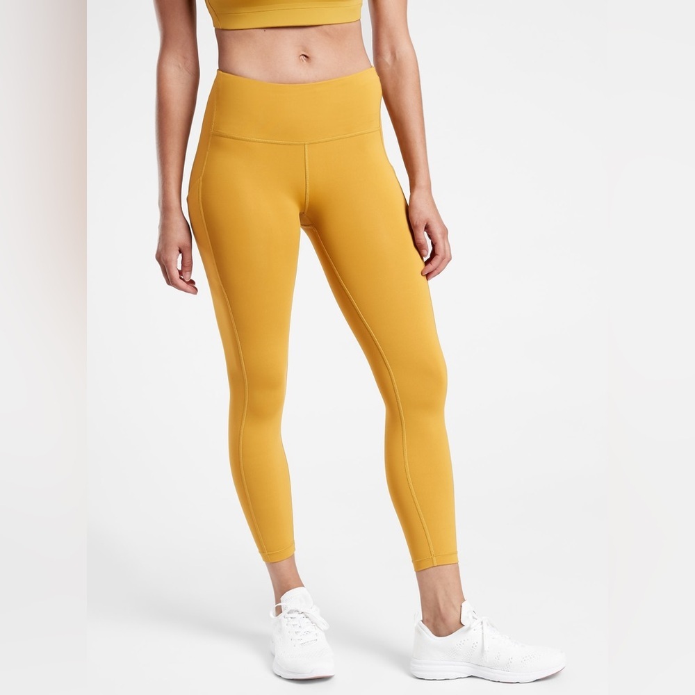 NWT ATHLETA Ultimate Stash Pocket 7/8 Tight yellow